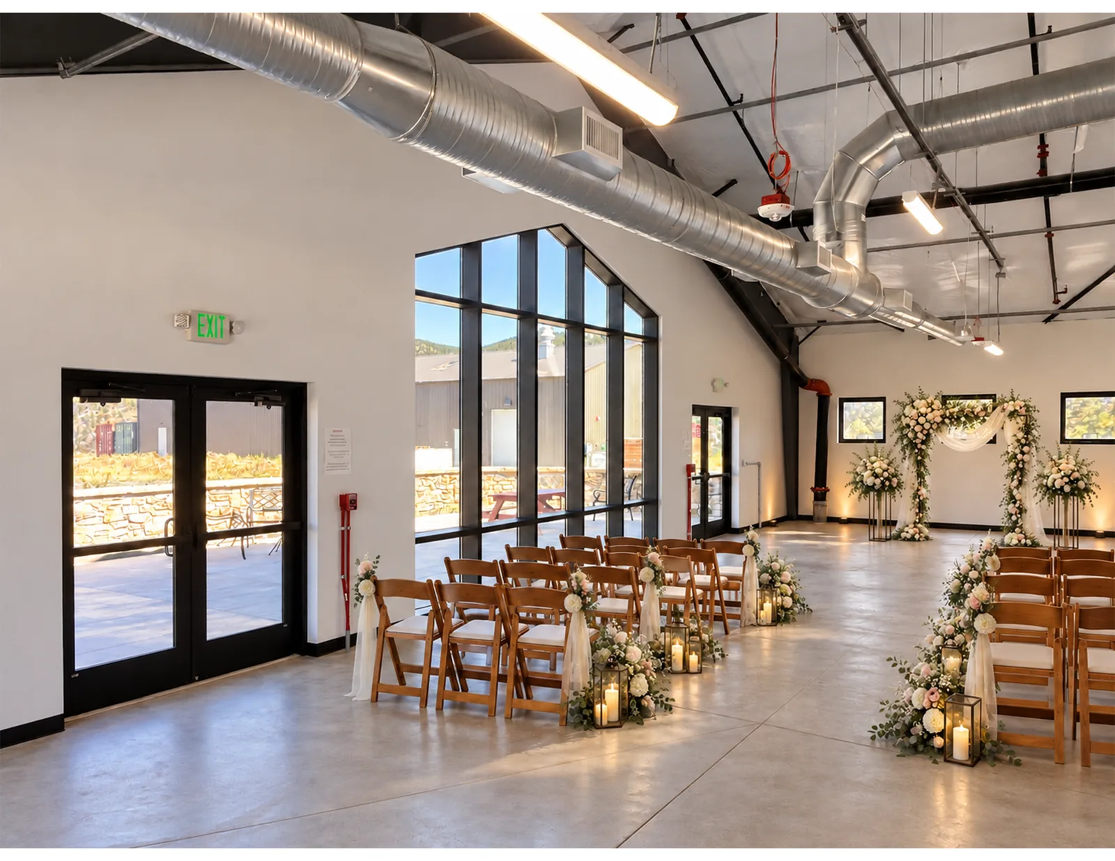 Wedding ceremony seating and floral arch in the event room